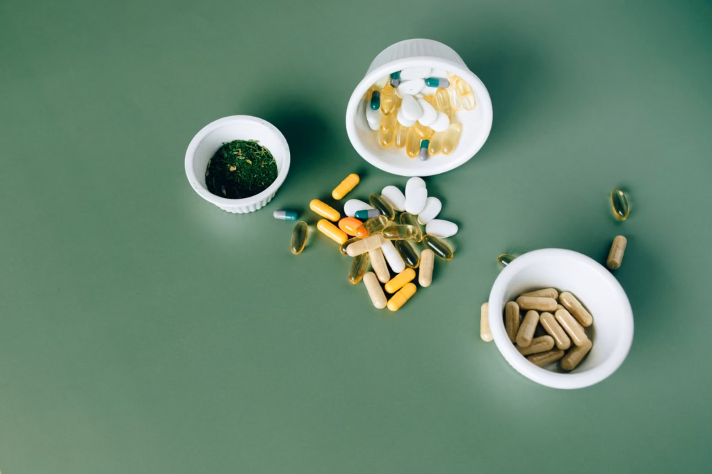 A bottle of probiotic capsules on a kitchen counter, illustrating a common supplement form