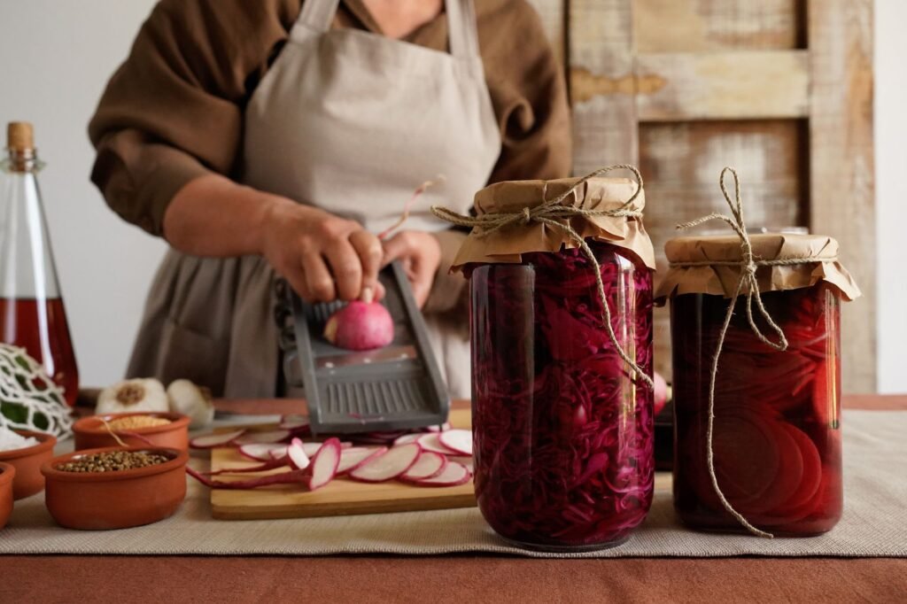 A bowl of colorful fermented vegetables illustrates probiotic-rich foods