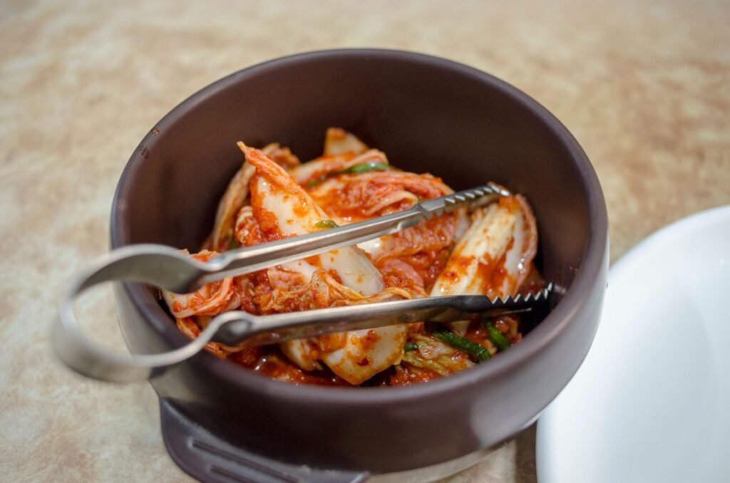 A bowl of kimchi, a classic fermented food rich in probiotics