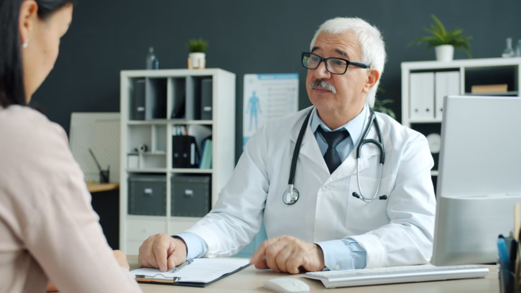 A clinician reviewing a patient’s chart, highlighting the importance of medical evaluation