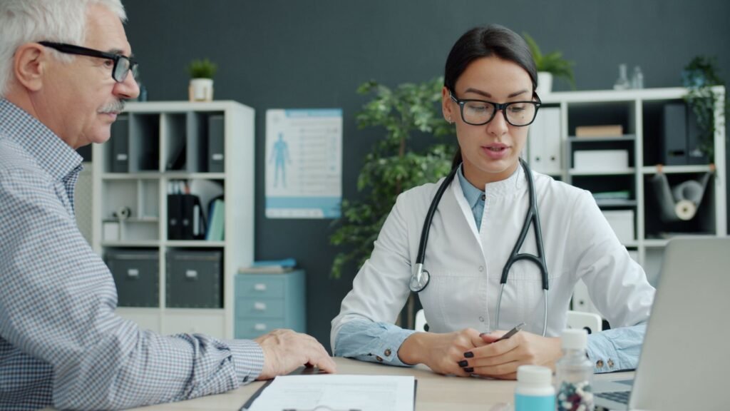 A clinician reviewing a patient’s medical history and symptoms