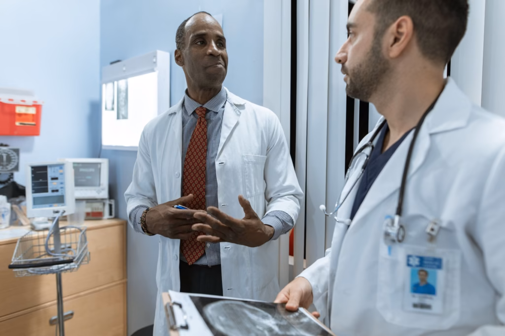 A doctor explains gut health to a patient, highlighting the role of diet and probiotics in digestion