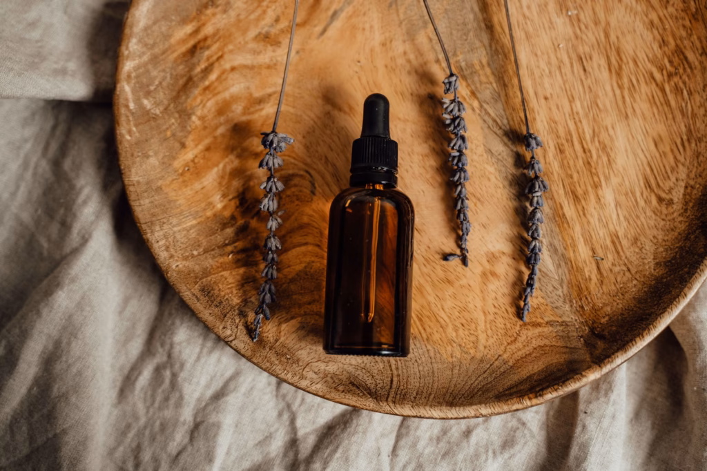 A dropper bottle of organic oil of oregano, showing the label for pure, steam-distilled oil