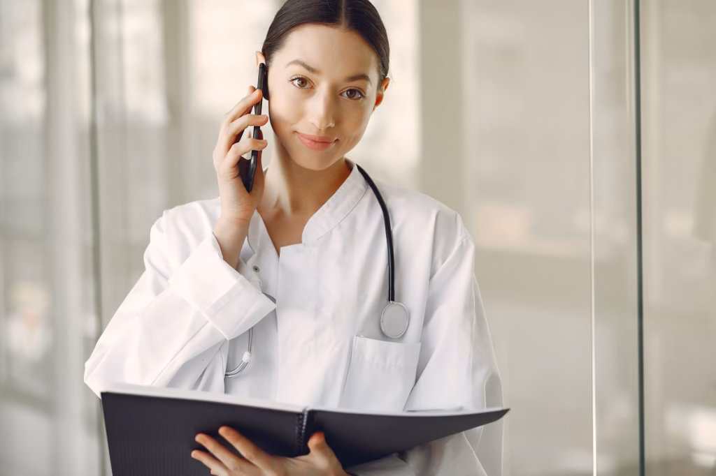 A patient reviewing a symptom diary with an intracranial hypertension specialist