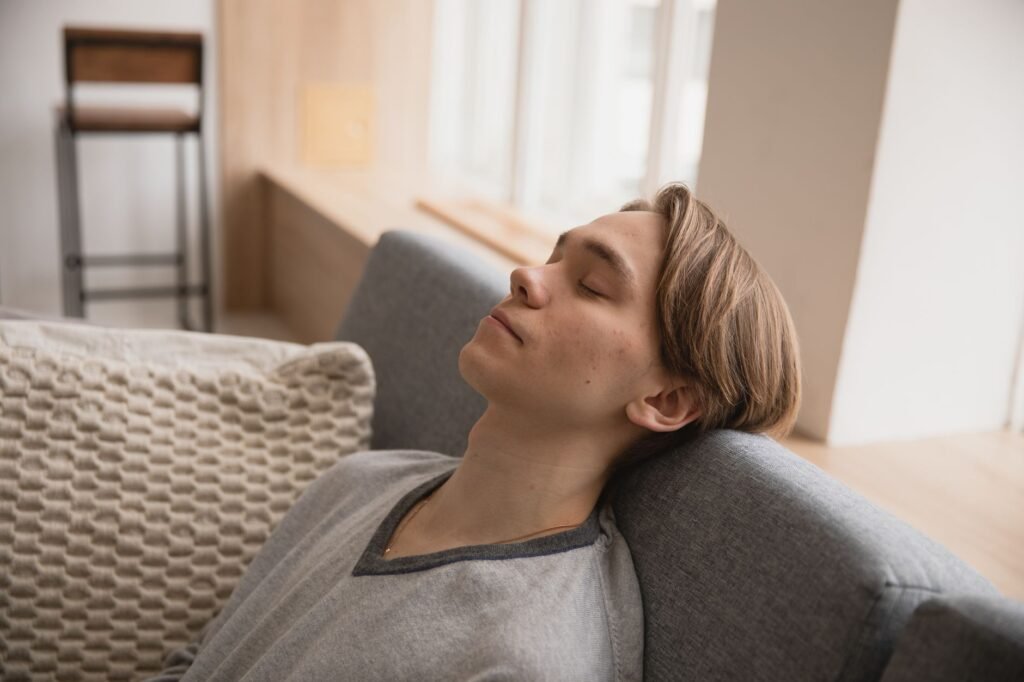 A person practicing deep breathing to support gut health